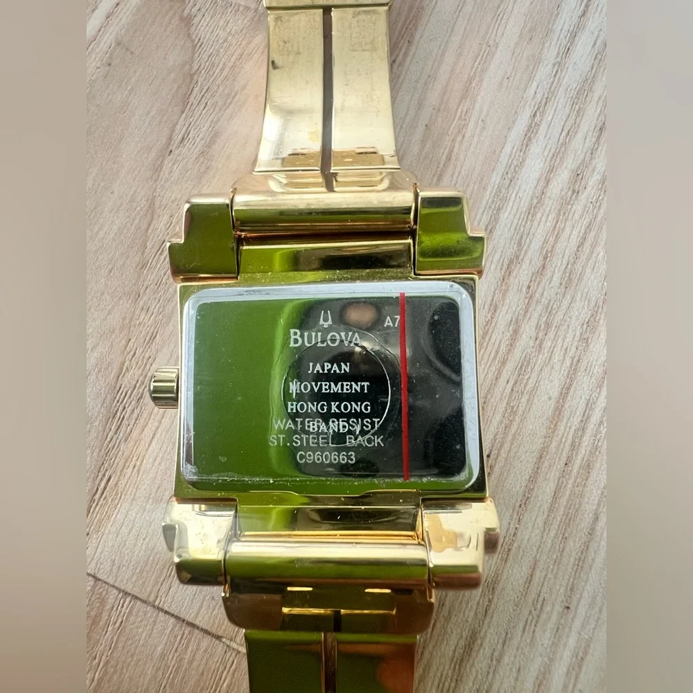 Rare Bulova ladies rectangular gold tone diamond dress watch NEW BATTERY